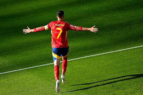 Alvaro Morata celebrates after scoring the opening goal